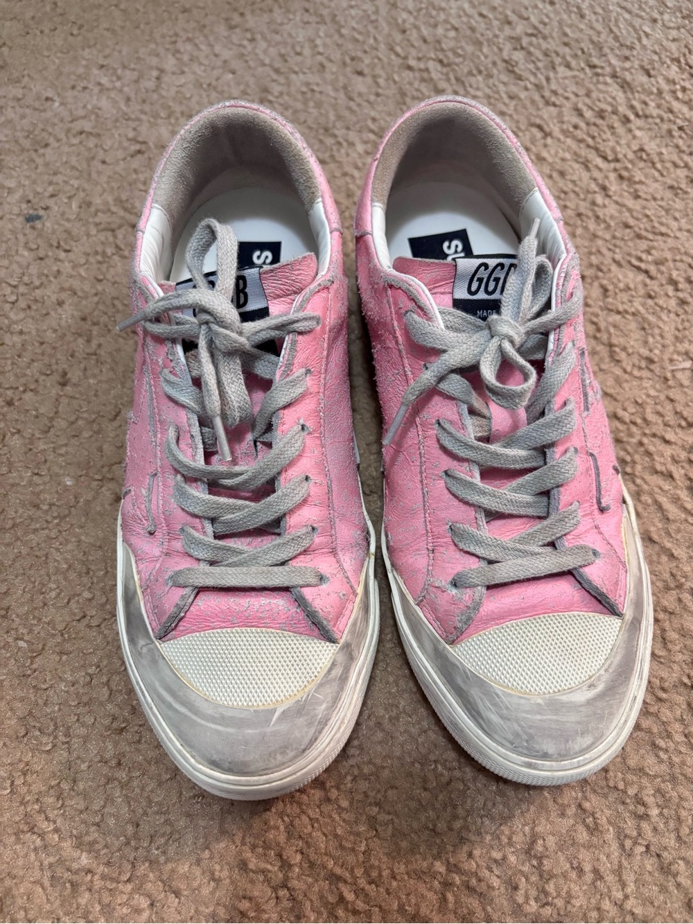 Golden Goose Pink Low-Top Sneakers with Silver rubber trim.